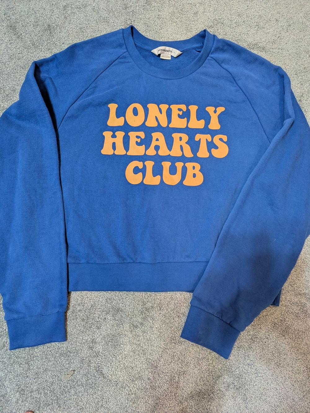 Eleven Paris Blue Crewneck with Orange 'Lonely Hearts Club' Graphic